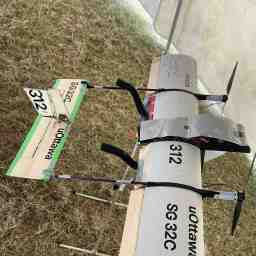 SG32C on a stand in a tent at comp