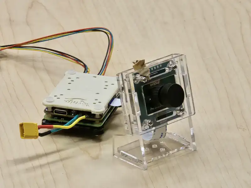 the CM4 stack wired to the Arducam OV2311 as a proof-of-concept